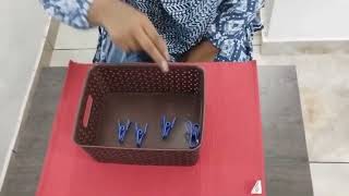 Pegging with cloth pegs  Montessori [upl. by Ilojne]