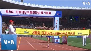 International Runners Participate in North Koreas annual Pyongyang Marathon [upl. by Enicnarf283]