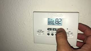 How to Reset an AC Thermostat [upl. by Lucio31]