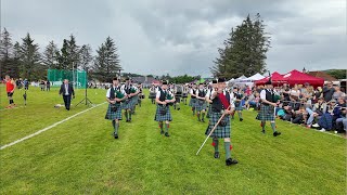 Drum Major leads Ballater Pipe Band playing Cabar Feidh on march during 2024 Dufftown Highland Games [upl. by Maddi]