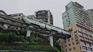 Subway train entering an apartment building at Liziba Station Chongqing China 🇨🇳 21 Oct 2024 [upl. by Basilius809]