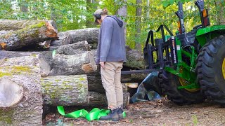 Transporting logs with 4044m Polaris Ranger and Rhino USA tow strap [upl. by Mays]