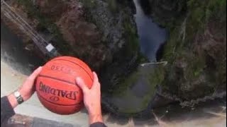 What Happens When a Spinning Basketball is Thrown Off a Dam [upl. by Eenor94]