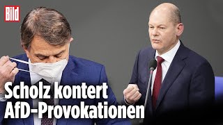 AfDPolitiker kritisiert Impfpflicht Scholz kontert  Regierungsbefragung im Bundestag [upl. by Vinita501]