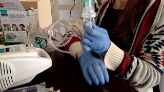 How to use a nebulizer including saline solution from an IV bag [upl. by Anitsua8]