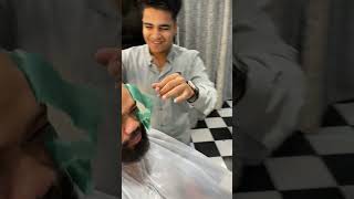 Man gets his whole face and ears waxed during his first haircut in the UAE [upl. by Cliff]