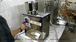 Granules powder garam masala filling machine  weighing based filling machine 5 grm to 200 grm [upl. by Raviv]