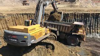 Volvo EC700B Excavator Loading Caterpillar Dumpers [upl. by Esyahc]