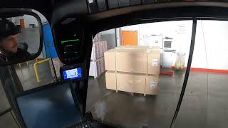 Unloading trailer with floor and seeling POV E50 Forklift from Linde [upl. by Coltin]