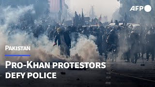 ProKhan protestors defy police to reach Pakistan capital  AFP [upl. by Parsaye]