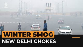 New Delhi chokes as winter haze thickens [upl. by Ragen]