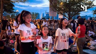 Taylor Swift in Singapore Fans outside the National Stadium sing along with the concert [upl. by Yrol]