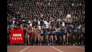 North Korea Runners take part in Pyongyangs marathon  BBC News [upl. by Aynotal]