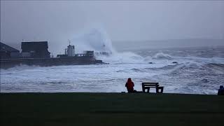 Storm Eleanor waves crash against lighthouse in Porthcawl Wales UK [upl. by Flss]