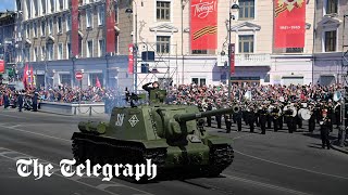 Russias Victory Day Parade Putin watches single tank drive down Red Square [upl. by Ueihttam]