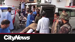 Dozens killed in Pakistan train station bombing [upl. by Oakie]