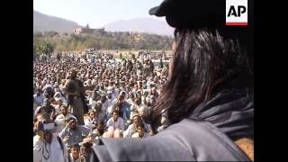 Masked militants join thousands in protest against Musharraf [upl. by Ahsyat851]