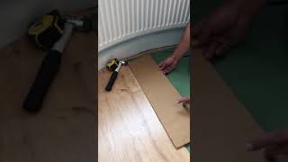 How to lay laminate flooring around a curved window bay [upl. by Osnerol]