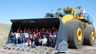 Huge Caterpillar 994 Wheel Loader 215 Tons Loading Caterpillar 777F Dumpers  Samaras Mining Group [upl. by Perni845]