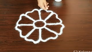 freehand flower rangoli designs  easy freehand kolam  simple flower muggulu designs [upl. by Yeltihw]