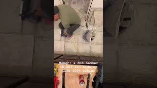 Bathroom demo floor tile removal diy demo tile bathroom hammer shorts renovation remodel [upl. by Sadnalor249]