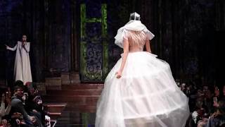 Model in wedding dress FALLS during Sheguang Hu FallWinter 2017 fashion show NYFW [upl. by Gladdy]