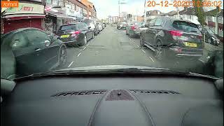 Driver opens car door into oncoming vehicle [upl. by Ahtreb]