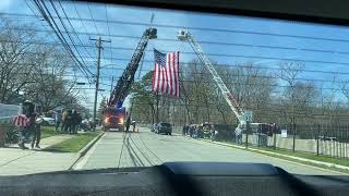 North Merrick FD ladder 673 amp Malverne FD ladder 434 rising a flag for NYPD officer 33024 [upl. by Adlih822]