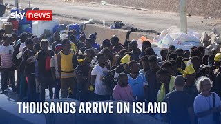 Lampedusa Thousands of migrants arrive on Italian island [upl. by Aikimat]