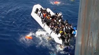 Migrants Flee Sinking Dinghy in Dramatic Footage [upl. by Swift]