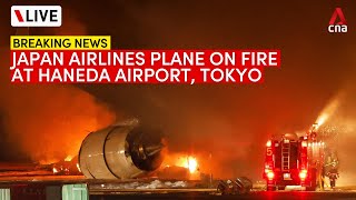 LIVE Japan Airlines plane on fire at Tokyos Haneda Airport [upl. by Ellatsyrc]