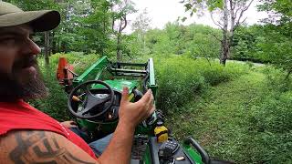 John Deere 4044M pushing trees over [upl. by Sivi]