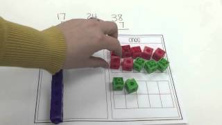 Addition with Regrouping using Manipulatives [upl. by Philbrook]