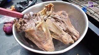 How to eat Goats Head in Nigeria [upl. by Gnoy]