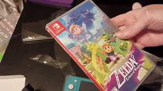 Unboxing Nintendo Switch Lite And Game [upl. by Tips]