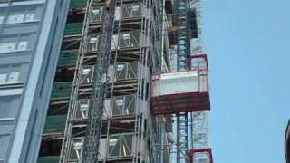 Close Up Of UBS Construction Hoists Heron Tower London [upl. by Hcahsem310]