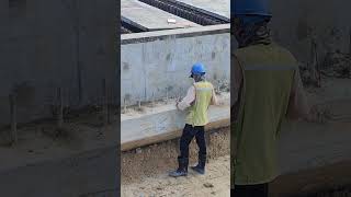 Worker clean concrete on corbel before top up mortar [upl. by Meece437]