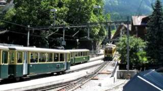 Trains crossing in Wengen [upl. by Natlus]