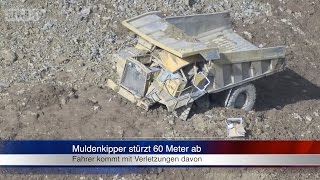 21102014 KG Muldenkipper stürzt 60 Meter in die Tiefe  Fahrer entkommt mit Verletzungen [upl. by Bouton]