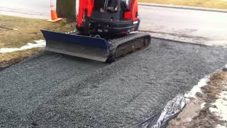 My mini excavator Dozer Blade Extension makes grading driveways and moving loose materials easy [upl. by Cindi]