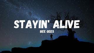 Bee Gees  Stayin Alive LYRICSLETRA [upl. by Roxie]