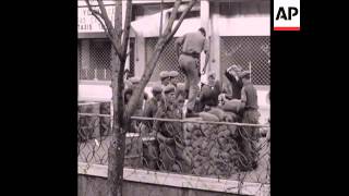 CAN329 UNITED NATIONS PEACE KEEPING FORCE HELP TO BUILD BARRICADES OUTSIDE THE LEDRA PALACE HOTEL [upl. by Notlrahc811]