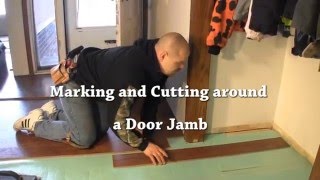 Laminate Installation Cutting laminate flooring around a doorjamb [upl. by Whitver]