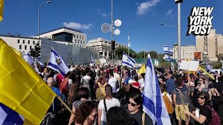 Protesters hold a rally at Netanyahus Jerusalem office to demand a hostage deal [upl. by Reichel]