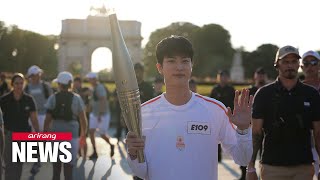 Olympic Torch Relay touches down in host city Paris [upl. by Elleniad]