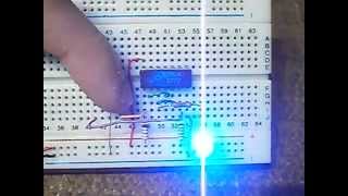 On off Switch  touch sensor made of two NAND elements RS trigger [upl. by Ytrebil562]