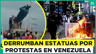 Derrumban estatua de Hugo Chávez Duros enfrentamientos y protestas en Venezuela [upl. by Marsden]