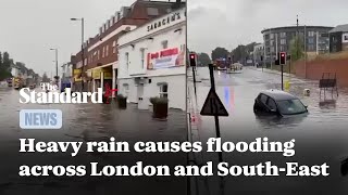 Heavy rains cause flooding and transport chaos across London and surrounding areas [upl. by Margy]