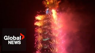 New Years 2024 Taiwans Taipei 101 lit up with dazzling fireworks [upl. by Ahsenak884]