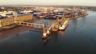 Aerial view of Port of Tilbury with boats and cruise ships moored at sunset [upl. by Aleihs295]